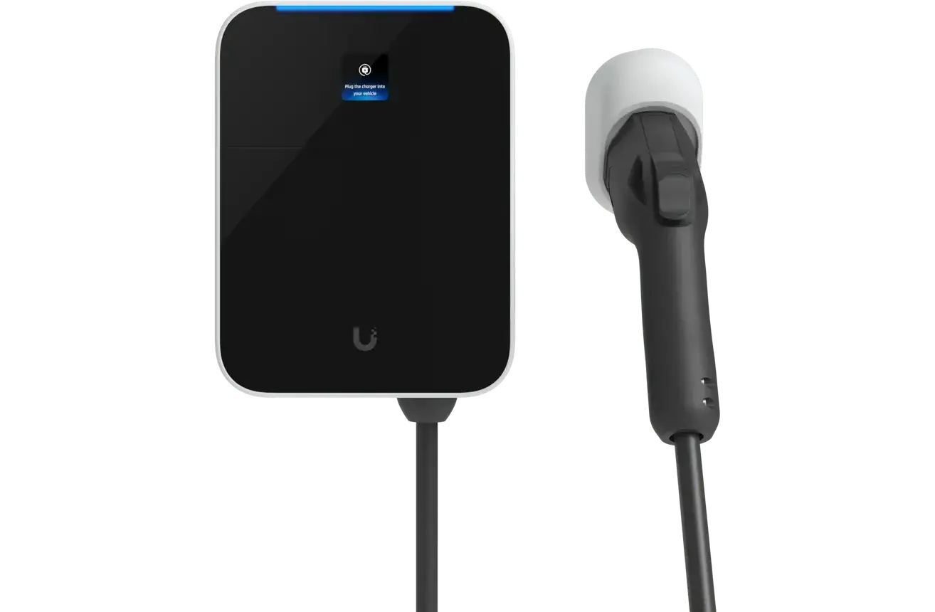 A charging point with its connector alongside